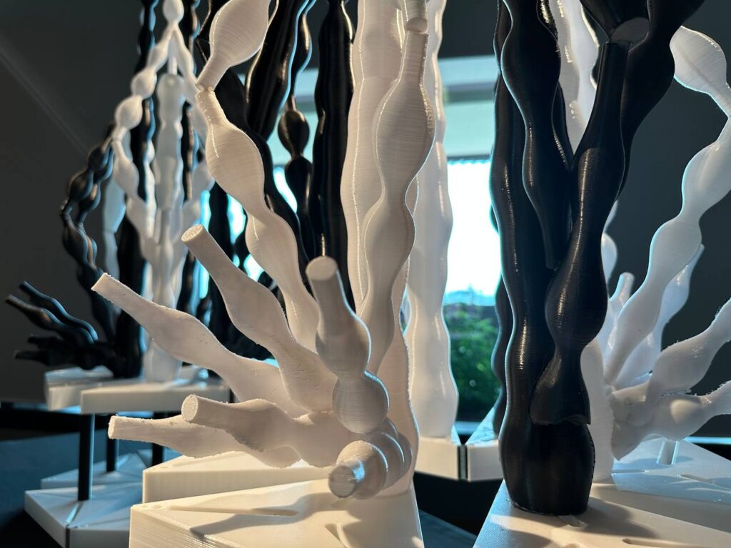 A close-up of 3D printing kinetic sculpture