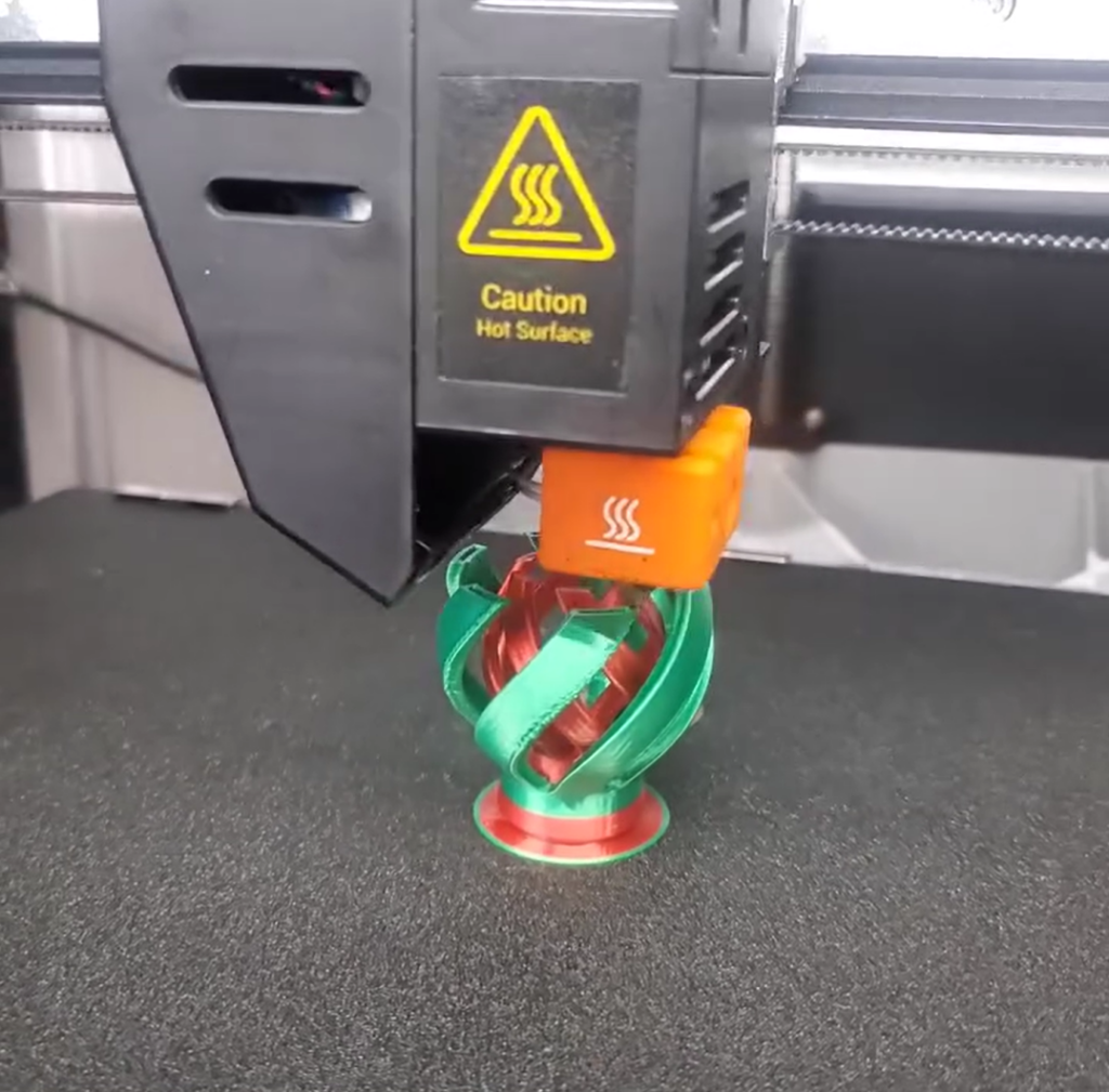 Image provided by Tim Maxwell 3D Printed Christmas Ornaments Shiny Spiral Sphere