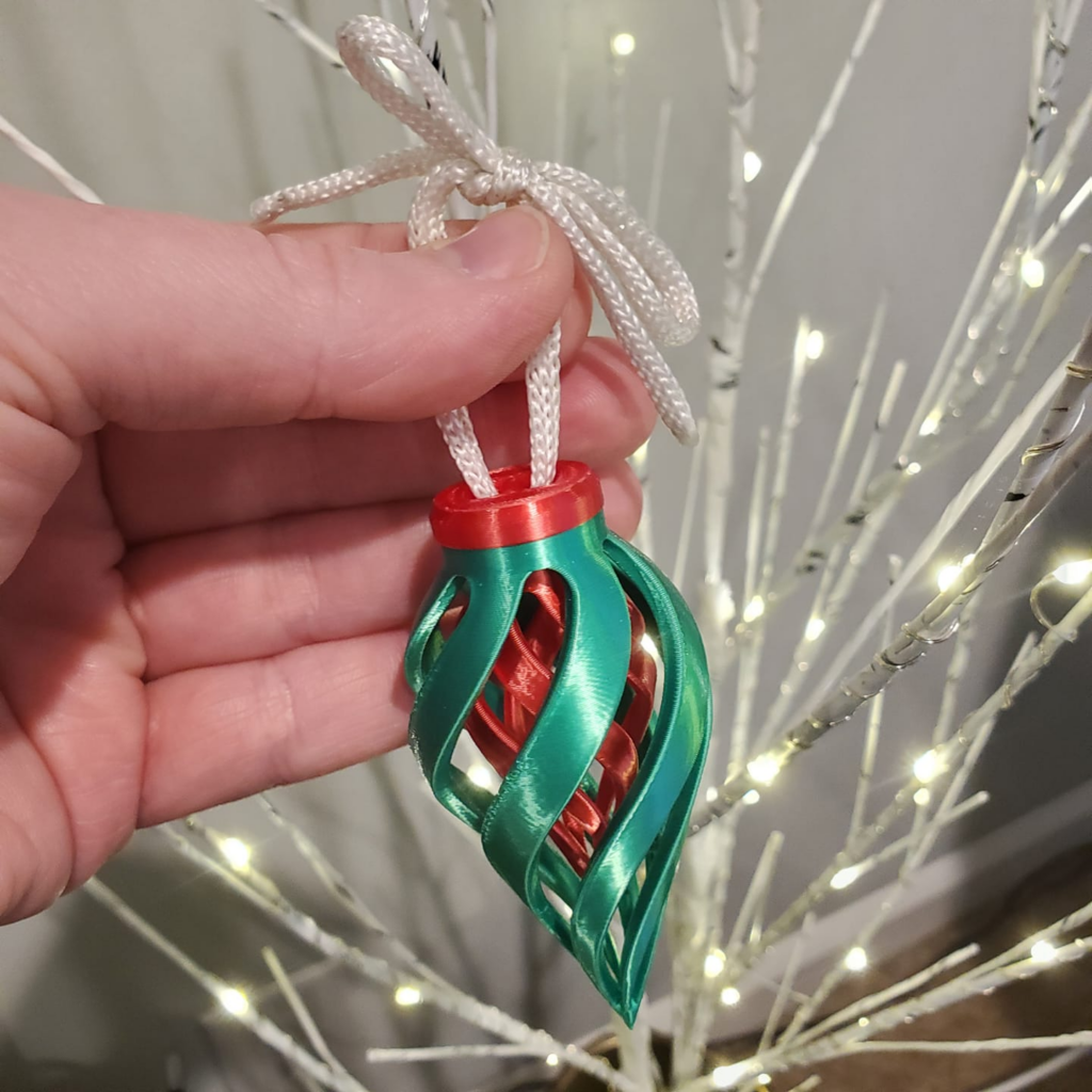 Image provided by Tim Maxwell 3D Printed Christmas Ornaments Shiny Spiral Sphere