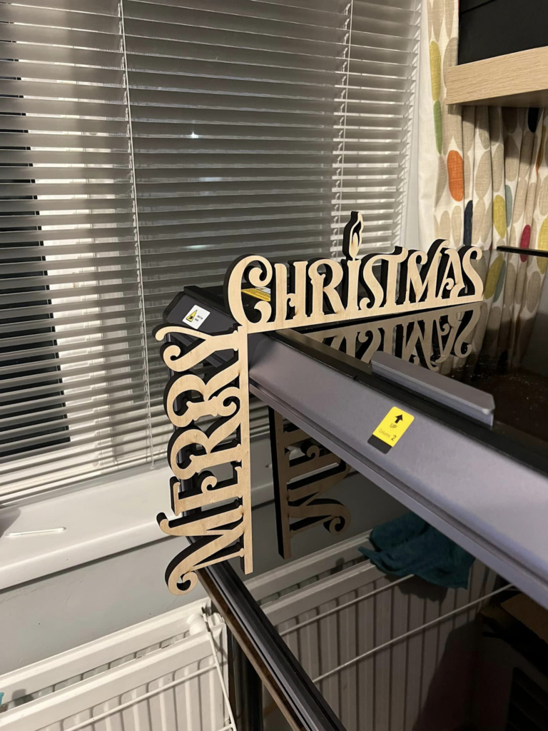 Image provided by Chris Coldbreath Laser Engraved Christmas Ornament "Merry Christmas" Text